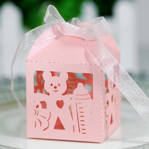 Pink laser-cut paper gift box featuring a cute bear and milk bottle with white ribbon