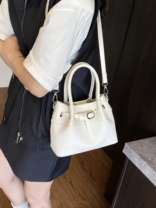 Chic cream white woven bucket bag with smooth splicing and adjustable shoulder strap