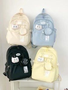Waterproof nylon school backpack in four colors with cute cat charms and star coin pouch