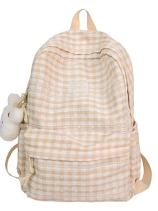 Lightweight plaid backpack for school with lace details and a white plush keychain charm