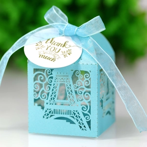 Blue laser cut Eiffel Tower wedding candy box with Thank You tag and organza ribbon
