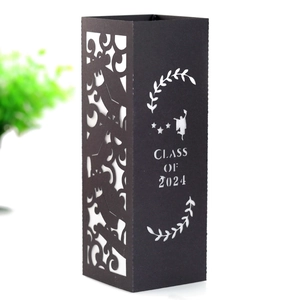 Detail of Class of 2024 laser-cut paper lantern featuring intricate floral hollow patterns