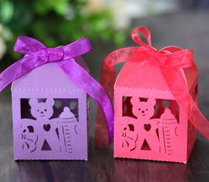 Pink and purple hollow bear candy boxes with ribbon bows for baby shower party favors