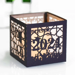 Class of 2024 graduation laser-cut black paper lantern with warm LED candle glow