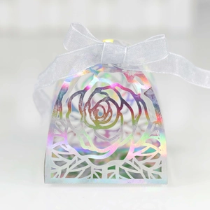 Holographic laser-cut rose gift box with a white ribbon bow for wedding and party favors