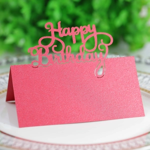 Detail of pink glitter Happy Birthday place card with hollow laser cut design