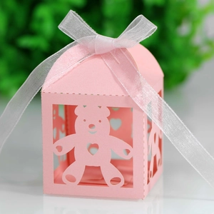 Pink laser-cut gift box featuring cute bear and heart patterns with a white organza ribbon
