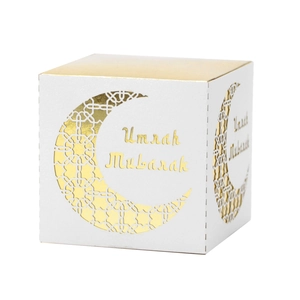 Detailed laser-cut moon pattern and gold Umrah Mubarak text on white gift box