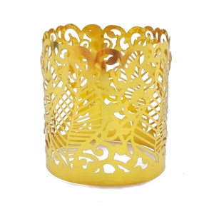 Detailed view of golden laser-cut napkin ring with elegant floral and butterfly vine patterns