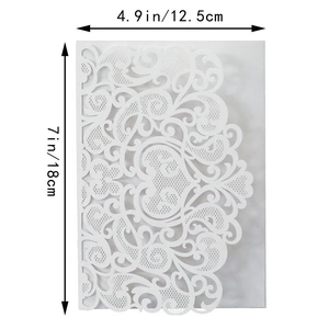 Detail of laser cut white lace wedding invitation sleeve with 5x7 inch dimensions