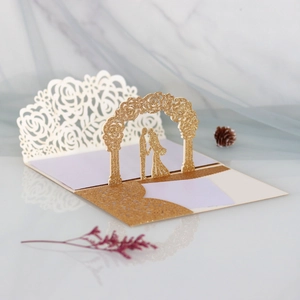 Detail of 3D pop-up card with laser-cut glitter rose arch and romantic couple silhouette