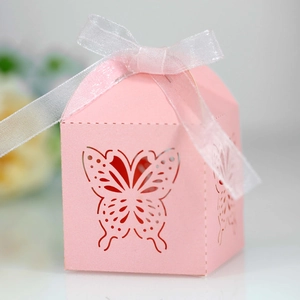 Detailed laser-cut butterfly hollow pattern on pink paper wedding favor candy gift box