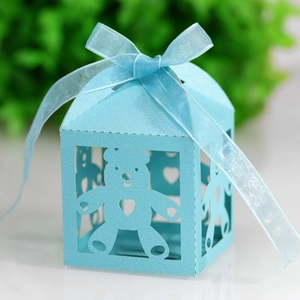 Detailed laser-cut light blue baby bear candy box with an elegant translucent ribbon bow