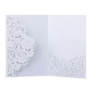 Detailed laser-cut floral patterns on white wedding invitation card with card pocket
