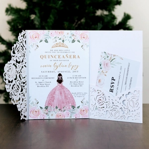 Detail of pink floral Quinceañera invitation set with white laser-cut outer sleeve