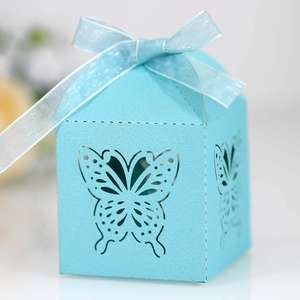 Detailed laser-cut butterfly hollow pattern on light blue wedding favor gift box
