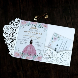 Detailed view of laser-cut rose hollow wedding invitation with RSVP card set
