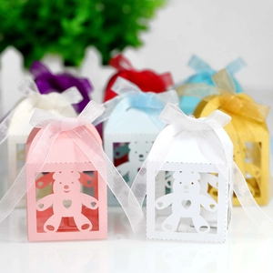 Detailed laser-cut baby bear candy boxes with ribbon bows in multiple colors