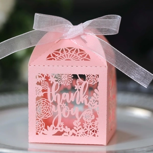Detailed laser-cut pink gift box with Thank You cutout and delicate white ribbon