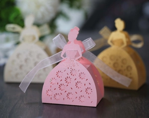 Detailed laser cut bridal silhouette favor boxes with ribbon and rose patterns