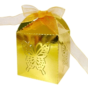 Golden laser cut butterfly candy box with yellow chiffon ribbon for wedding favors