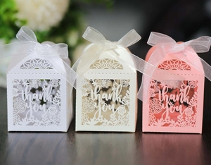 Detailed laser-cut gift boxes with thank you design and elegant ribbons for weddings