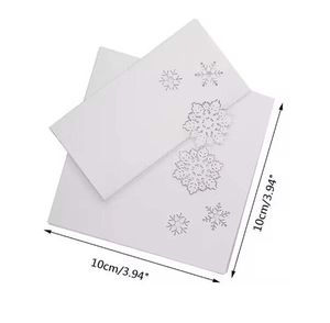 Laser-cut white snowflake place cards for Christmas table decor, 10x10cm paper cards