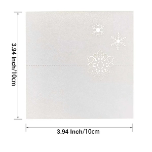 Detailed dimension view of white snowflake laser cut place card measuring 3.94 inches