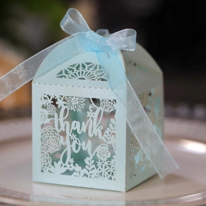 Laser cut light blue gift box with thank you design and elegant silk ribbon bow