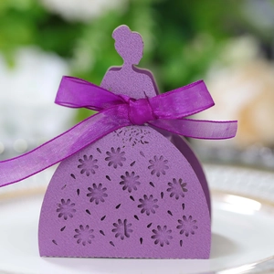 Detailed laser-cut purple hollow wedding favor box in elegant dress shape with ribbon