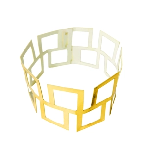 Detailed view of hollow gold square geometric napkin ring with glossy finish
