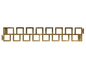 Detail of gold napkin ring featuring a classic geometric hollow square fretwork pattern