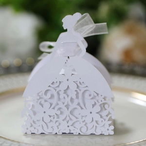 Detailed laser-cut bridal gown candy box with floral patterns and ribbon bow