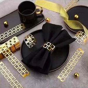 Elegant gold hollow geometric napkin rings set for wedding tables and banquet decor