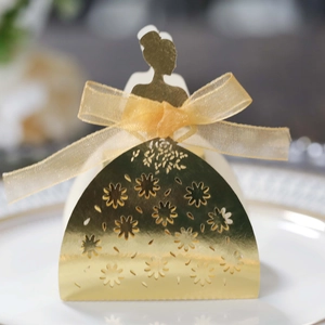 Laser-cut gold bridal silhouette candy box with decorative bow for wedding gifts