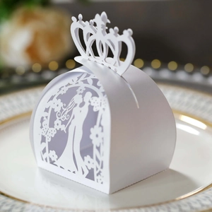 Elegant white laser-cut wedding favor box with crown top and couple silhouette