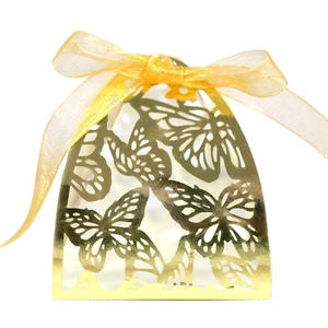 Elegant gold butterfly laser-cut candy box with yellow ribbon for wedding and party favors