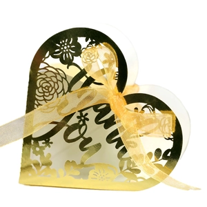 Golden heart-shaped laser-cut gift box with floral pattern and Thank You ribbon