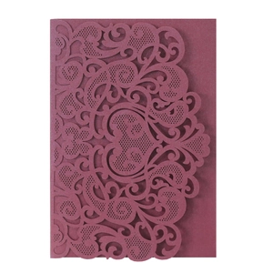 Burgundy laser-cut hollow heart invitation cover with glitter texture and scroll patterns