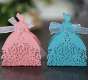 Detailed laser-cut flower patterns on pink and blue princess dress candy boxes