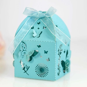 Detailed laser-cut hollow butterfly pattern on Tiffany blue cardstock wedding gift box