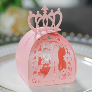 Detailed laser cut pink wedding favor box with crown top and couple silhouette