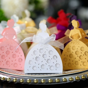 Laser cut princess dress candy boxes in various colors with elegant ribbon decorations