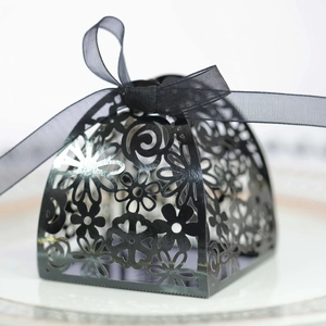 Detailed laser-cut black floral gift box featuring a delicate black organza ribbon bow
