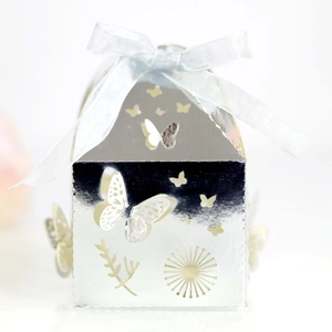 Detailed laser-cut butterfly gift box in silver finish with blue silk ribbon bow