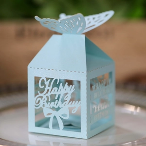 Light blue laser-cut Happy Birthday candy box with butterfly topper and floral patterns