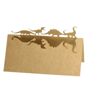 Laser cut kraft paper dinosaur place cards for party table setting and name tags