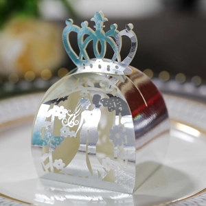 Laser cut wedding favor box with iridescent crown and bride groom silhouette