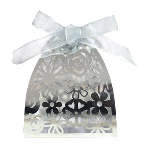 Elegant silver laser-cut floral candy box with blue satin ribbon for weddings and parties