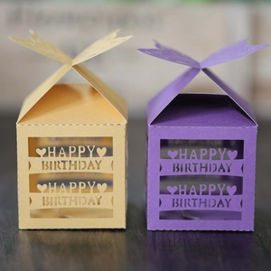 Laser-cut Happy Birthday candy boxes with butterfly tops and hollow heart patterns